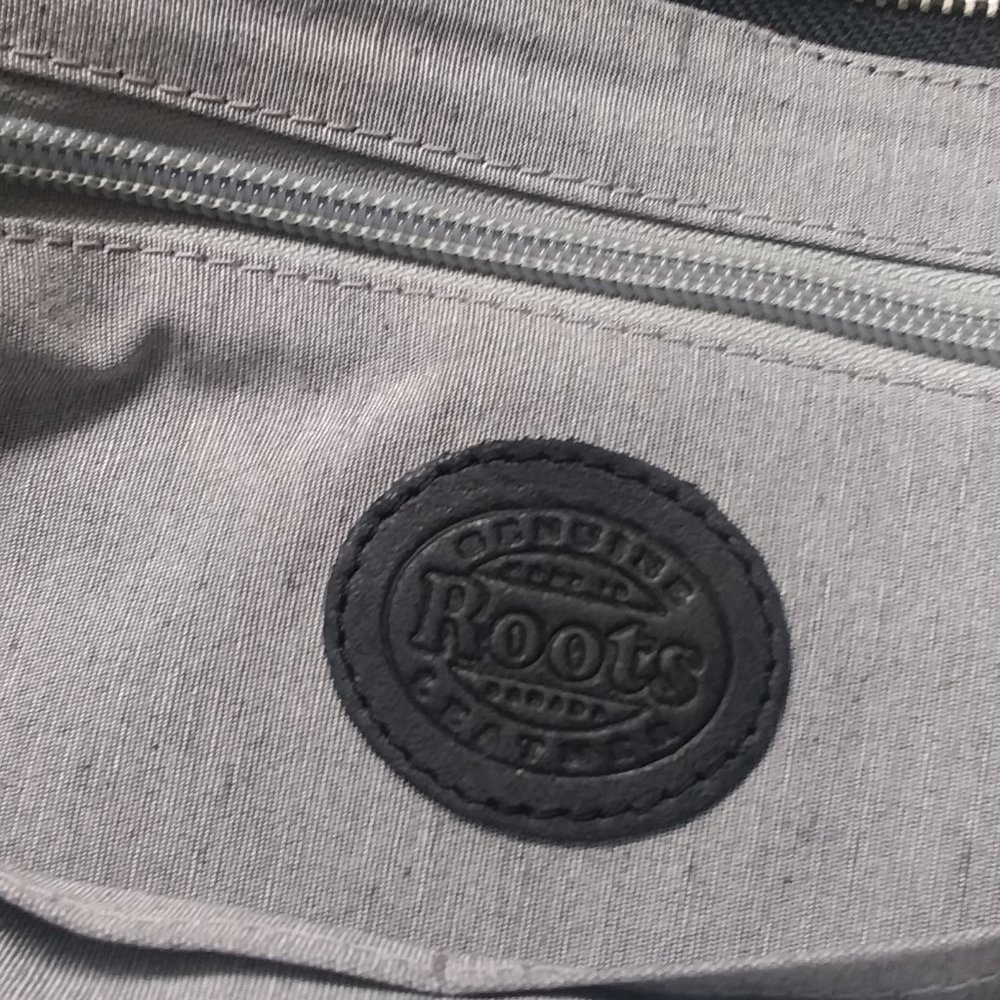 Almost new Jet Black Roots handbag